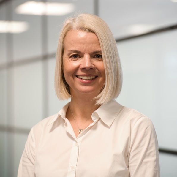 female corporate headshot at there place of work 