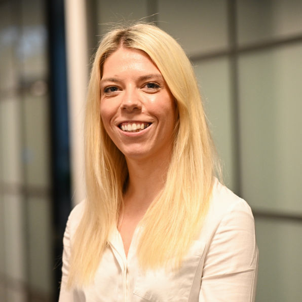 female corporate headshot at there place of work 
